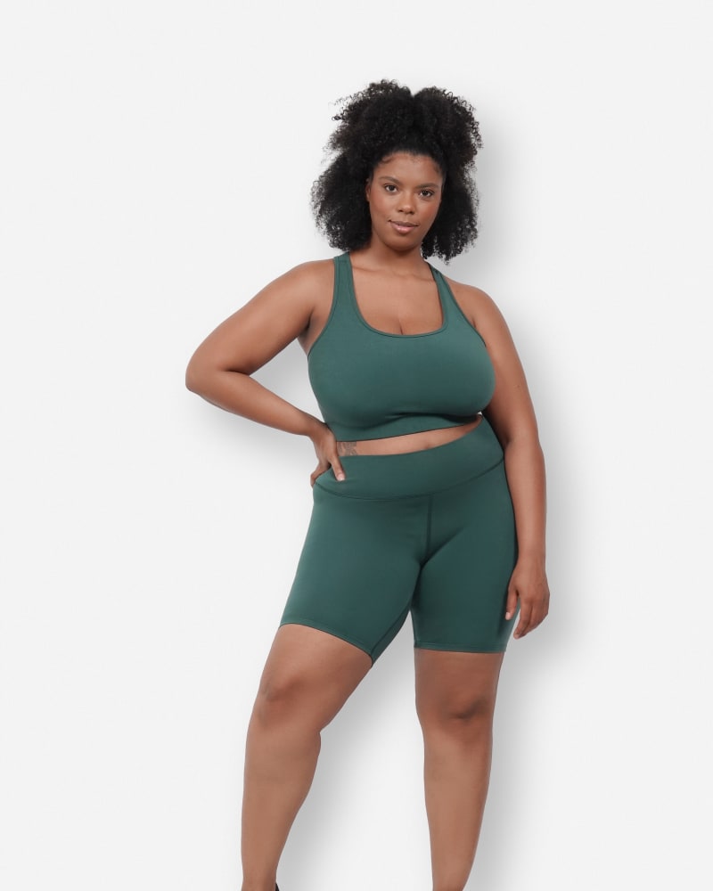 Front of a model wearing a size 4X Aspen Shorts in Ivy by Reprise Activewear. | dia_product_style_image_id:275376
